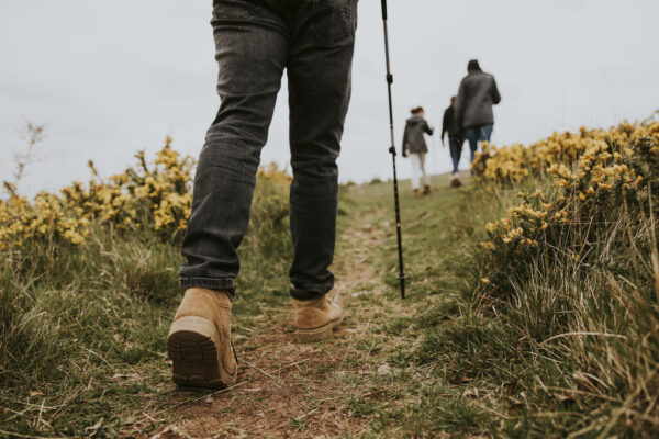walkers hiking up hill